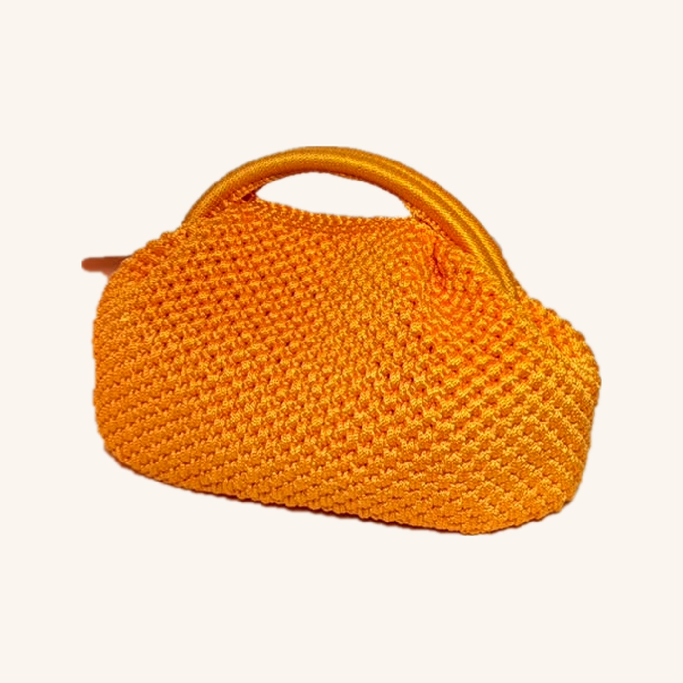 The Sika Pouch — hand-crocheted marigold bag